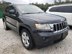 Jeep Grand Cherokee salvage cars for sale: 2011 Jeep Grand Cherokee Laredo