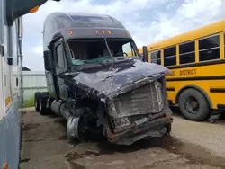 Salvage trucks for sale at Eldridge, IA auction: 2011 Freightliner Cascadia 125