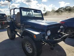 Salvage cars for sale from Copart Fort Pierce, FL: 2002 Jeep Wrangler / TJ Sport