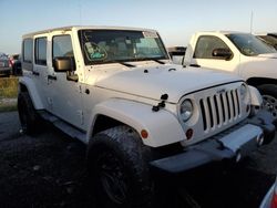 Salvage vehicles for parts for sale at auction: 2010 Jeep Wrangler Unlimited Sahara