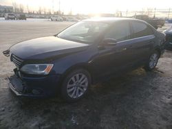 Salvage cars for sale from Copart Rocky View County, AB: 2011 Volkswagen Jetta TDI