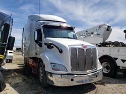 Salvage trucks for sale at Elgin, IL auction: 2017 Peterbilt 579