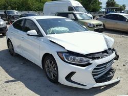 Salvage cars for sale from Copart Fort Pierce, FL: 2017 Hyundai Elantra SE