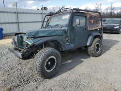 Salvage cars for sale from Copart Lumberton, NC: 2001 Jeep Wrangler / TJ Sahara