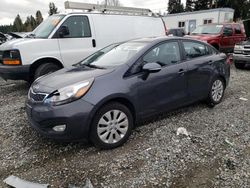Salvage cars for sale from Copart Graham, WA: 2015 KIA Rio EX