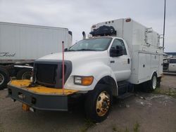 Salvage trucks for sale at Woodhaven, MI auction: 2011 Ford F750 Super Duty