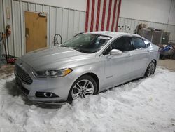 Salvage cars for sale at Des Moines, IA auction: 2016 Ford Fusion Titanium HEV