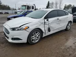 Salvage cars for sale from Copart Bowmanville, ON: 2013 Ford Fusion SE