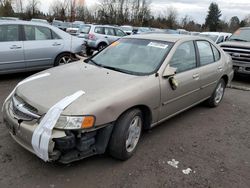 Salvage cars for sale from Copart Portland, OR: 2001 Nissan Altima XE