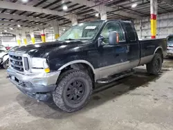 Salvage cars for sale from Copart Woodburn, OR: 2003 Ford F250 Super Duty
