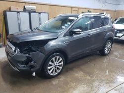 Salvage cars for sale at Kincheloe, MI auction: 2017 Ford Escape Titanium