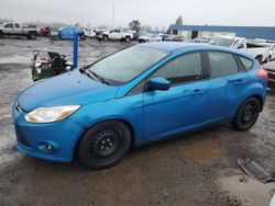 Salvage cars for sale at Woodhaven, MI auction: 2012 Ford Focus SE