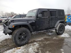 Salvage cars for sale from Copart Duryea, PA: 2015 Jeep Wrangler Unlimited Sport