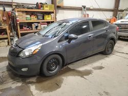 Salvage cars for sale from Copart Nisku, AB: 2013 KIA Rio LX