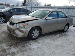 Salvage cars for sale from Copart Ontario Auction, ON: 2004 Toyota Camry LE
