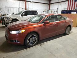 Salvage cars for sale at Billings, MT auction: 2014 Ford Fusion Titanium