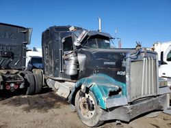 Salvage trucks for sale at Brighton, CO auction: 2000 Kenworth Construction W900