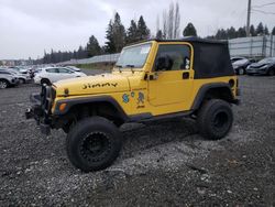 Salvage cars for sale from Copart Graham, WA: 2000 Jeep Wrangler / TJ SE