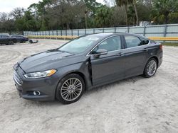 Salvage cars for sale from Copart Fort Pierce, FL: 2015 Ford Fusion SE