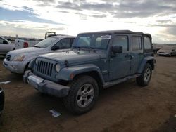 Salvage cars for sale at Brighton, CO auction: 2014 Jeep Wrangler Unlimited Sahara