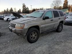 Salvage cars for sale from Copart Graham, WA: 1999 Jeep Grand Cherokee Laredo
