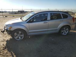 Salvage cars for sale from Copart Houston, TX: 2010 Dodge Caliber SXT