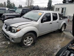 Salvage cars for sale from Copart Graham, WA: 2007 Nissan Frontier Crew Cab LE