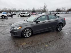 Salvage cars for sale at Woodburn, OR auction: 2019 Ford Fusion SE