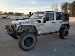 Salvage cars for sale from Copart Dunn, NC: 2010 Jeep Wrangler Unlimited Sport