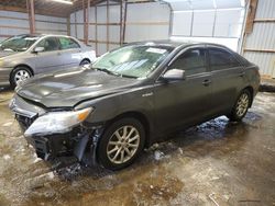 Salvage cars for sale from Copart Ontario Auction, ON: 2010 Toyota Camry Hybrid