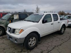Salvage trucks for sale at Woodburn, OR auction: 2006 Nissan Frontier Crew Cab LE