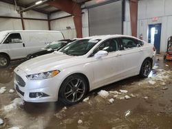 Salvage cars for sale at Lansing, MI auction: 2013 Ford Fusion Titanium