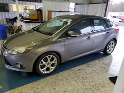 Salvage cars for sale at Grenada, MS auction: 2014 Ford Focus Titanium