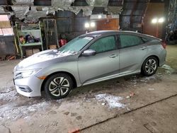 Flood-damaged cars for sale at auction: 2016 Honda Civic LX