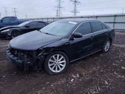 Salvage cars for sale from Copart Elgin, IL: 2012 Toyota Camry Hybrid