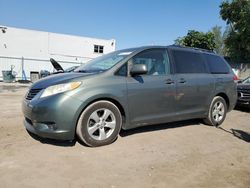 Salvage cars for sale at Opa Locka, FL auction: 2014 Toyota Sienna LE