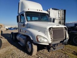Salvage trucks for sale at Farr West, UT auction: 2013 Freightliner Cascadia 125