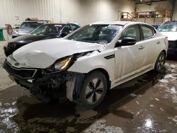 Salvage cars for sale from Copart Rocky View County, AB: 2011 KIA Optima Hybrid