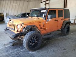 Salvage cars for sale from Copart Lufkin, TX: 2013 Jeep Wrangler Unlimited Sport