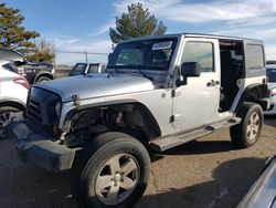 Salvage cars for sale from Copart Albuquerque, NM: 2012 Jeep Wrangler Unlimited Sport