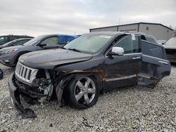 SUV salvage a la venta en subasta: 2011 Jeep Grand Cherokee Overland