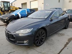 Flood-damaged cars for sale at auction: 2014 Tesla Model S