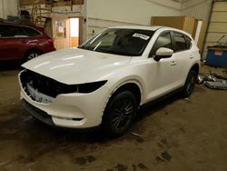 Salvage vehicles for parts for sale at auction: 2021 Mazda CX-5 Touring