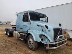 Salvage trucks for sale at Sikeston, MO auction: 2014 Volvo VN VNL