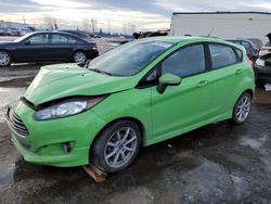 Salvage cars for sale from Copart Rocky View County, AB: 2015 Ford Fiesta SE