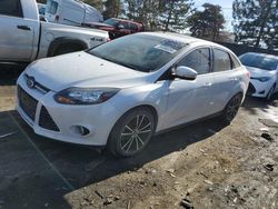 Salvage cars for sale at Brighton, CO auction: 2014 Ford Focus Titanium