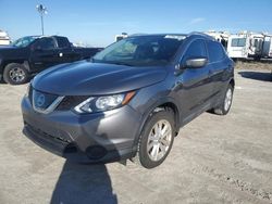 Nissan salvage cars for sale: 2019 Nissan Rogue Sport S