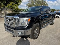 Salvage cars for sale at Opa Locka, FL auction: 2017 Nissan Titan XD SL