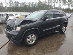 SUV salvage a la venta en subasta: 2011 Jeep Grand Cherokee Laredo