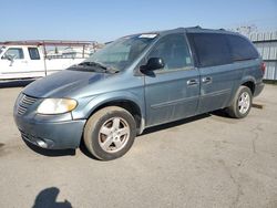 Salvage cars for sale from Copart Bakersfield, CA: 2005 Dodge Grand Caravan SXT